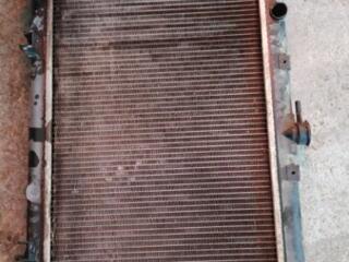 Продам б/у радиатор Nissan Primera