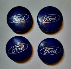 Оригинальные колпачки Ford.