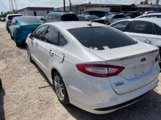 Продам по запчастям Ford Fusion Plugin Hybrid 2014 год