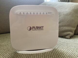 Модем ADSL PLANET с WI-FI, поддерживает IP-TV - 150 рублей.