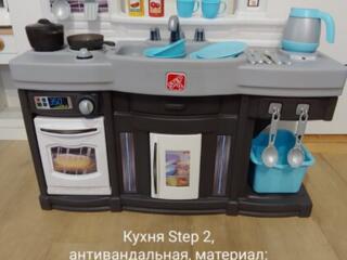 Продам развивающие фирменные игрушки, коляска, детская кухня