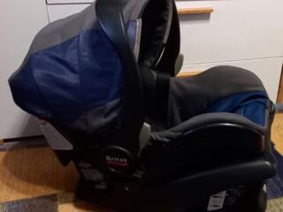 Scaunel auto calitativ cu suport de firma Britax (0 - 18 kg).