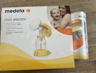 Молокоотсос электрический medela+ бутылочка medela calma