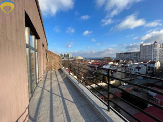 Квартира в новом доме в Аркадии с террасой и видом на море