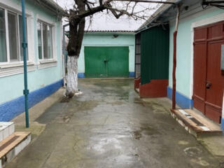 Котельцовый дом в Парканах14 сот, пл. 100,3 ком., удобства, гараж, торг!