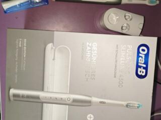 Электрическая зубная щетка