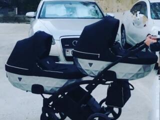 Шикарная коляска для двойни Junama