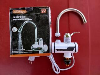 Продается проточный водонагреватель новый.