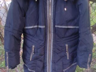 Продам пуховик б/у