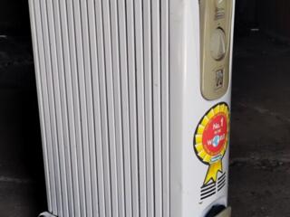 Продается электрический масляный радиатор б/у.