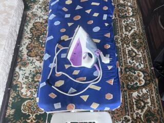 Гладильная доска и утюг