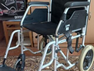 Инвалидная коляска б/у.