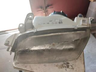 Продам фару L к авто Тойота Карина Е