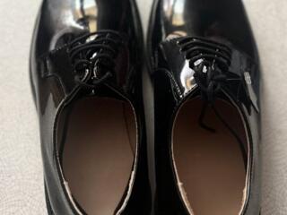 Продам новые мужские туфли