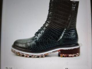 Продам новые кожаные ботинки.