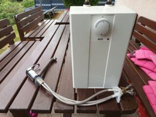Продается компактный проточный водонагреватель AEG Huz 5 Basis!