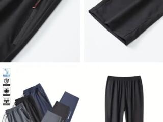 Отличные спортивные брюки с молниями на карманах. 50; 52; 54