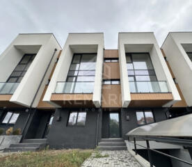 Confort, funcționalitate și liniște într-un townhouse pregătit să ...