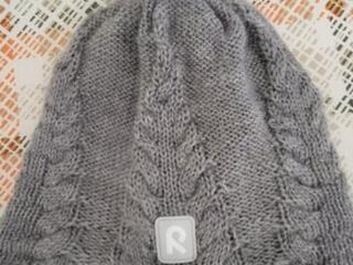 Продам шапку reima