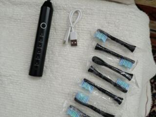 Продам новую электрическую зубную щетку Shenzhen m513.