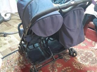 Коляска два места