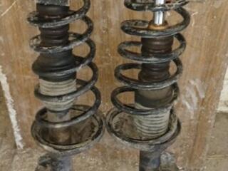 Задние амортизаторы