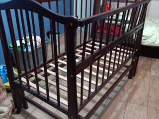 Кроватка детская маятник