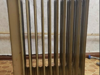 Продам масляный электрообогреватель