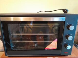 Печь духовая новая еще на гарантии 2024 года мощность 2000