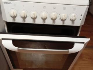 Электрическая плита с духовкой