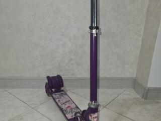 Самокат трёхколёсный