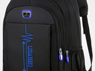 Новый черный рюкзак.