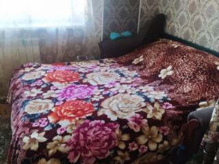 Продам самостоятельную комнату в коммуне в Лузановке. Кирпичный дом. .