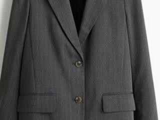 Продам новый костюм