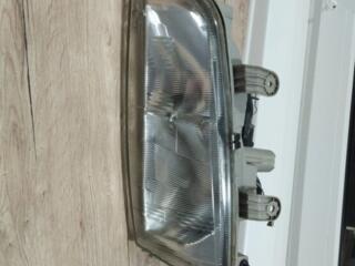 Левая фара на Nissan Primera P11