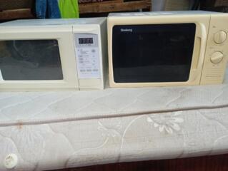 Микроволновые печи с грилем Daewoo и Elenberg
