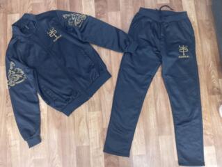 Продам новый костюм