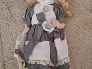 Фарфоровый куклы