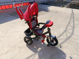 Велосипед-коляска.