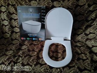 Продам крышку для унитаза, новые шторки для ванной, шланги