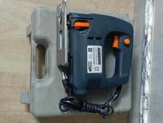 Фирменный электролобзик. Практически новый.