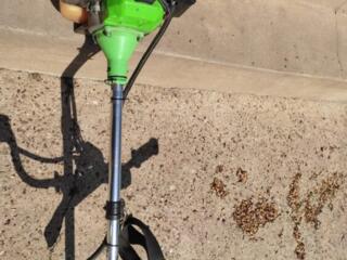 Бензиновый триммер (мотокоса)