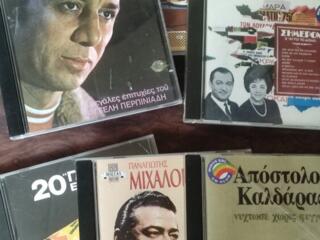 CD диски: Караоке, Кулинария, Греческая музыка; Для программистов....
