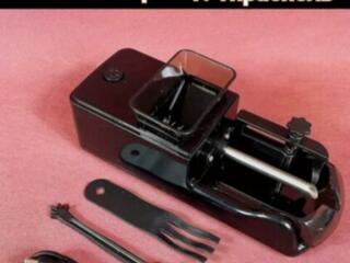 Машинка-станочек для наполнения сигаретных гильз табаком.