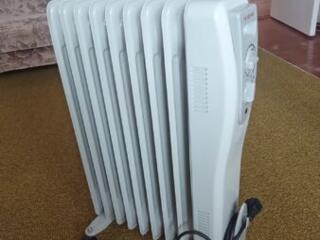 Продам масляный обогреватель 2 кВт