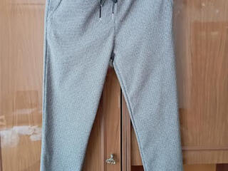 Pantaloni cu dungi de damă XL.