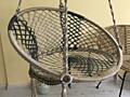 Плетёное подвесное кресло.