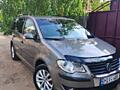 VW-TOURAN 2009г Газ-метан(28 куб) двиг 2.0 мех-ка 5ступ 7 МЕСТ