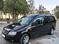 Volkswagen Caddy Maxi, 7 мест, 2.0 газ заводской 50 м3, бензин, 2009