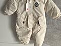Продам новый комбинезон зимний